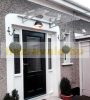 Aluminum canopy 270x95 cm gray anodized K1 type support arm with smoky gray solid polycarbonate cover and drainage.