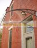 Canopy ZENN 120x100cm gray frame transparent solid polycarbonate (plexi). Between the two C-type support arms, the roof consists of one piece