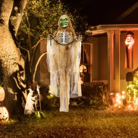  Animált függő csontváz halloween dekoráció 183 cm hosszú zölden világító fejjel és vörös mellkassal