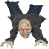 Animált kúszó zombi halloween dekoráció 159 cm hosszú vörös LED szemekkel és hanghatással