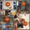 Világító halloween ajtókoszorú 44 cm-es tökfejjel, 44 LED-del és őszi levelekkel