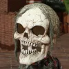 Animált földből előbújó csontváz halloween dekoráció 70 cm magas mozgással, világítással és hanghatással