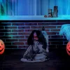 Animált szellem baba halloween dekoráció 83 cm magas mozgásérzékelővel, vörös szemekkel és hanghatással
