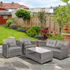4-piece polyrattan garden furniture set with sofa, coffee table, gray seat cushions
