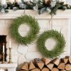 Műfenyő karácsonyi ajtókoszorú 60 cm átmérő, 88 ággal, 7 tobozzal zöld színben