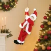 Éneklő és mászó Mikulás figura 60 cm magas, hangra aktiválódó, karácsonyi zenével és ajándékzsákkal