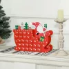 Fa adventi naptár 22,5x8x36 cm Mikulás szánon, 24 rekeszes karácsonyi öröknaptár piros