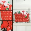 Fa adventi naptár 22,5x8x36 cm Mikulás szánon, 24 rekeszes karácsonyi öröknaptár piros