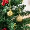 Mini LED-es karácsonyfa 60 cm magas, arany díszekkel, piros bogyókkal és melegfehér fényekkel