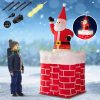 Inflatable Santa figure emerging from a Christmas chimney 178 cm with LED lighting, outdoor/indoor