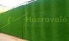 Economical artificial grass with 20 mm fibers can be used as a wall panel 2x25 meter roll 3 shades of green brilliant color easy installation min. 5000m2