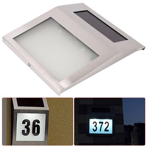 Solar lamp illuminating house number in small size. Outdoor design, flat shape, stainless steel, 2 LED lights. Waterproof and bird-proof design