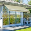 Awning for terrace 350x250 cm manually rollable terrace shade in cream color 