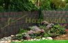 Polyrattan privacy tape 25 meter roll two-tone brown wind deflector that can be attached to a fence