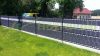 Polyrattan privacy tape, 80 meter roll, wind deflector that can be attached to a beige fence