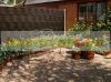 Polyrattan privacy tape 255 cm long 19 cm high light brown wind deflector that can be attached to a fence
