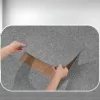 Moduláris padlószőnyeg elemek 12db x 305x305 mm puha párnázással, lehúzható és felragasztható világosszürke